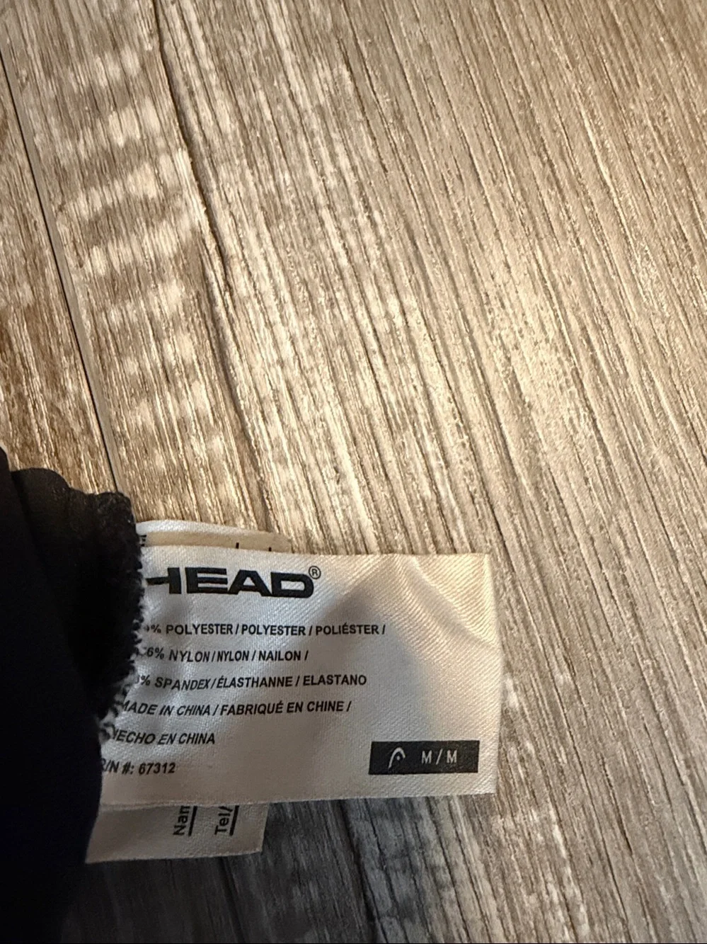 HEAD Kids Touchscreen Gloves featuring neon green branding and a connecting cli